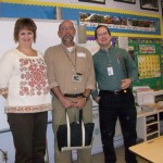 Teachers Kelly Chandler Rudy and Sam Lewis with Curt. I was Kelly's HS principal and Sam and his family are avid  readers.