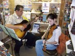 Champion fiddlers Ron Yule and Emily Young at a recent book event