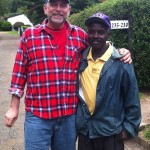 LSU fan club. I visit daily with Sam. (He says it "Sahm." The a in Swahil is "ah.") He cleans the roadway between our house and school.