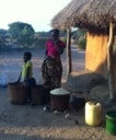 Margaret and her daughter Naomi getting the pot hot.