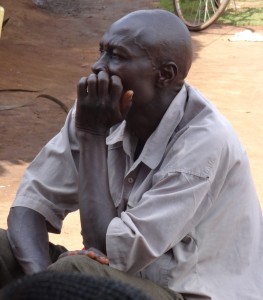 A Kakwa Man listens to the Gospel.