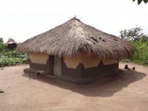 A typical K-people hut.  The black trim around border is unique to this group.