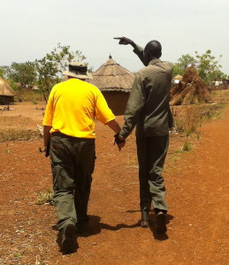 You can join hands with prayer for the South Sudan. Photo: Coy Webb of Kentucky and Abrahim Kiir of Bor, SS.