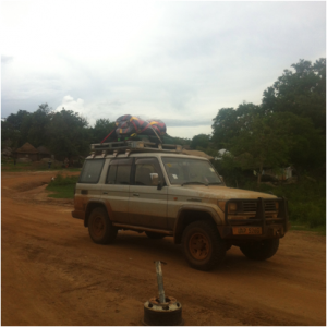 Our Land Cruiser, "MaMa Pearl" at a Ugandan Nile River Ferry crossing.  Lottie Moon funds provide our vehicles.