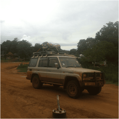 Our Land Cruiser, "MaMa Pearl" at a Ugandan Nile River Ferry crossing. Lottie Moon funds provide our vehicles.