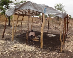 Mzee in his shelter.  Nyumazi Camp, Uganda