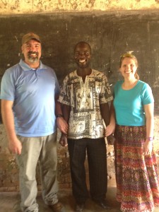 Todd and Jessica with their friend, Robert Zziwa.