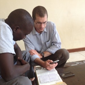 JD has brought a young person's insight to maximizing technology to share the Gospel. He is demonstrating how to insert a audio Bible SD card into a cell phone.