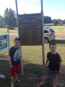 Two descendants of Joe Moore at the Westport Fight historical marker.  Jude and Luke Iles are 5x grandsons of Joe Moore, owner of the Westport store.