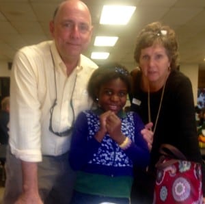 Daizy Mae Thomas with Curt and Dee. Thanksgiving 2015. Daizy comes from the Nebbi Tribe in Uganda. She and her mom, KB, are special friends of ours.  