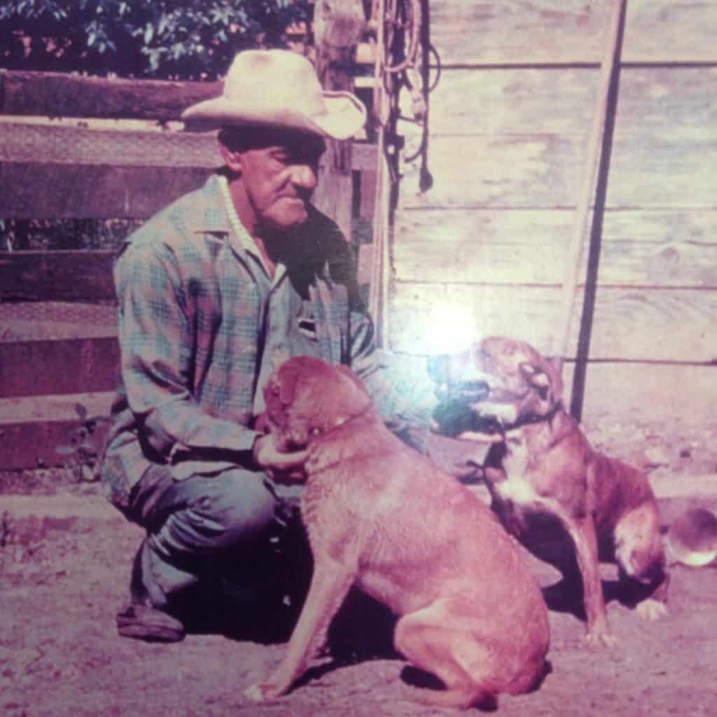 My PawPaw, Lloyd Iles, with his hog dogs. Circa 1965